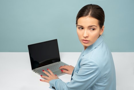 A person sitting at a computer